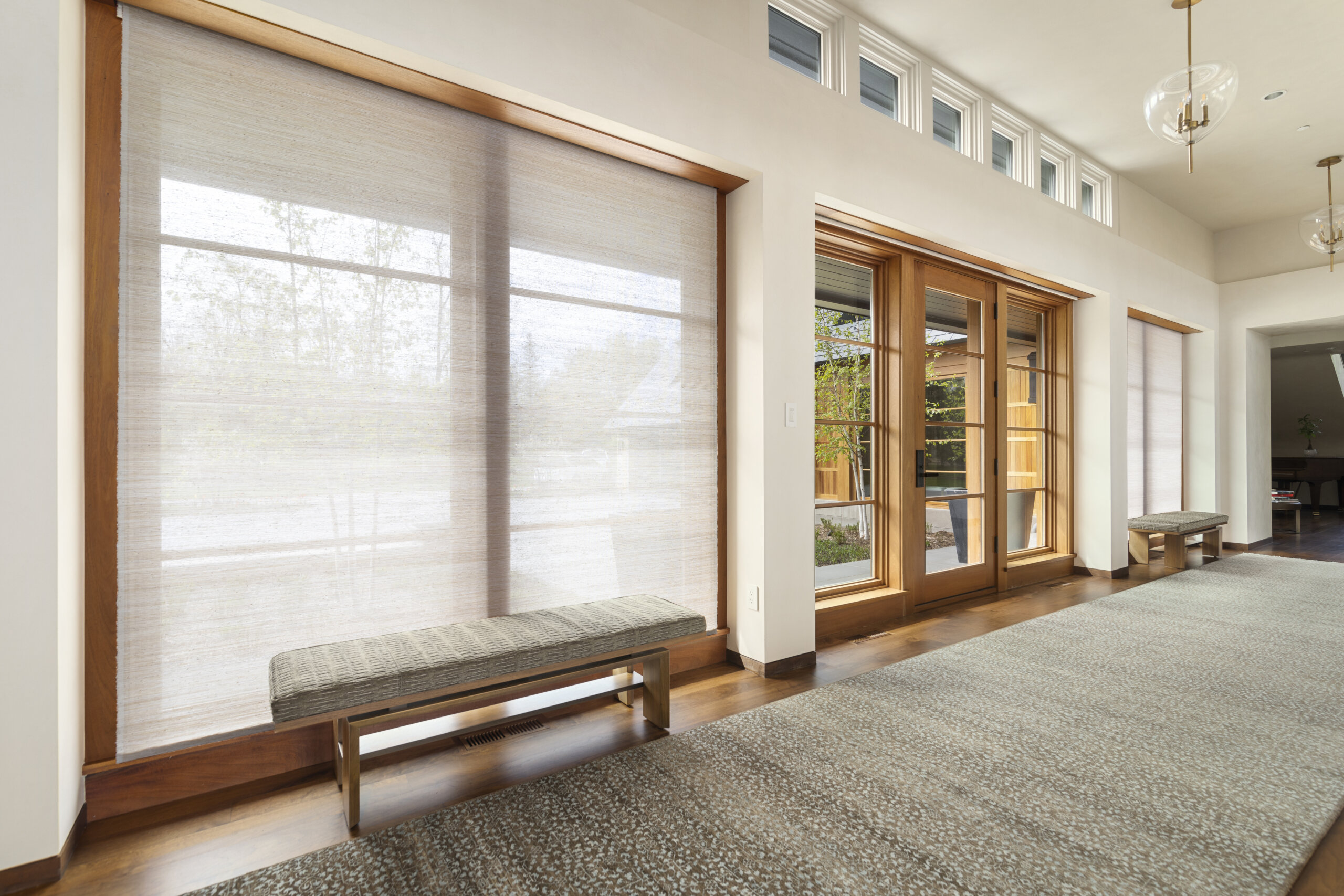 motorized shades with one window covered and one window open