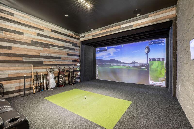 Golf simulator with wood walls